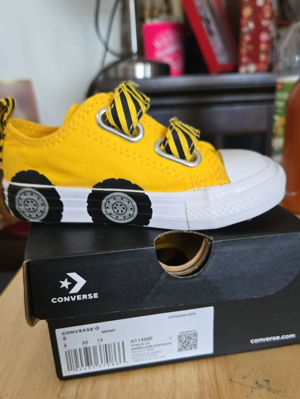 Converse Yellow Canvas Infant Sneaker with Black Wheel Motif
